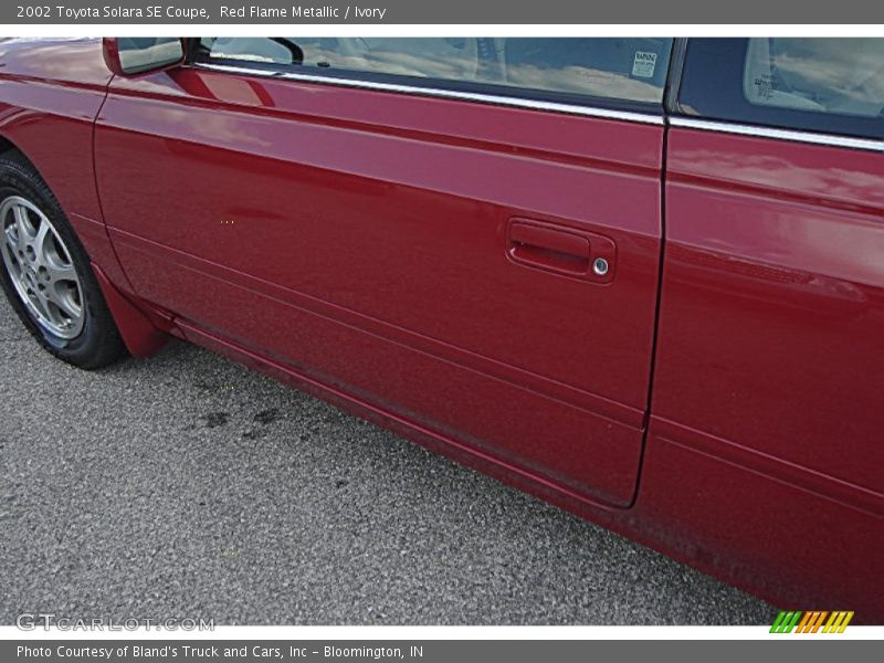 Red Flame Metallic / Ivory 2002 Toyota Solara SE Coupe