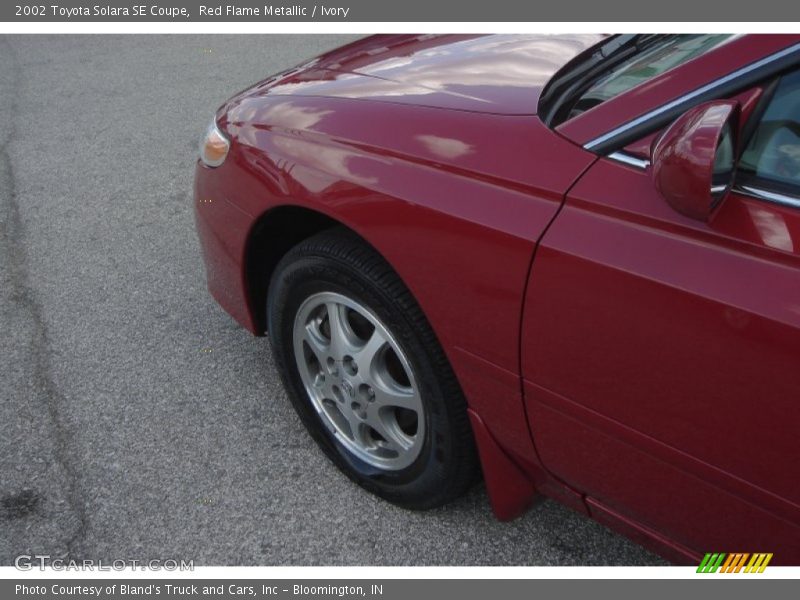 Red Flame Metallic / Ivory 2002 Toyota Solara SE Coupe