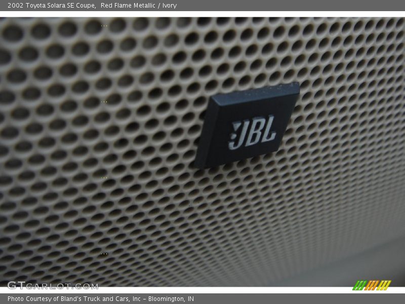 Red Flame Metallic / Ivory 2002 Toyota Solara SE Coupe