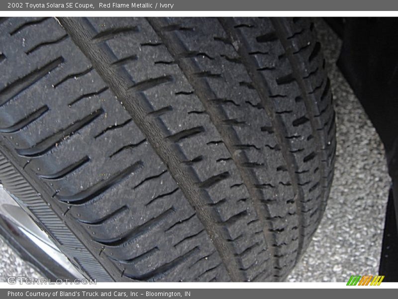 Red Flame Metallic / Ivory 2002 Toyota Solara SE Coupe