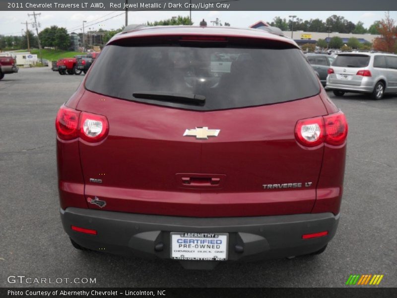 Red Jewel Metallic / Dark Gray/Light Gray 2011 Chevrolet Traverse LT AWD