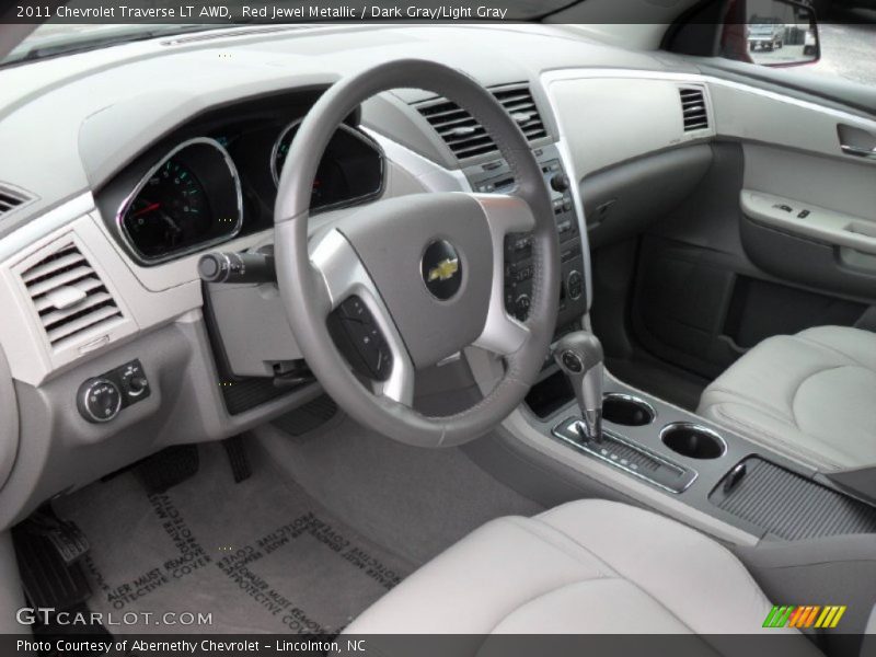 Red Jewel Metallic / Dark Gray/Light Gray 2011 Chevrolet Traverse LT AWD