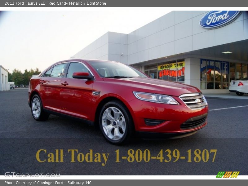 Red Candy Metallic / Light Stone 2012 Ford Taurus SEL