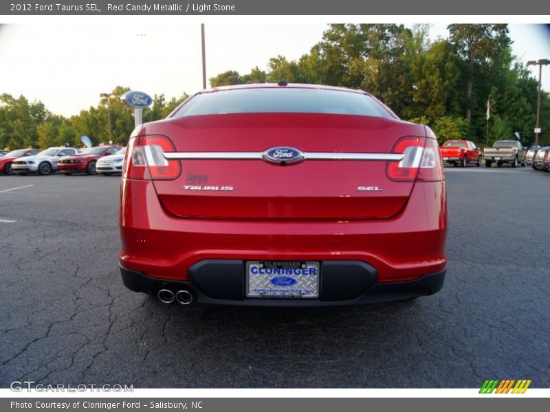 Red Candy Metallic / Light Stone 2012 Ford Taurus SEL