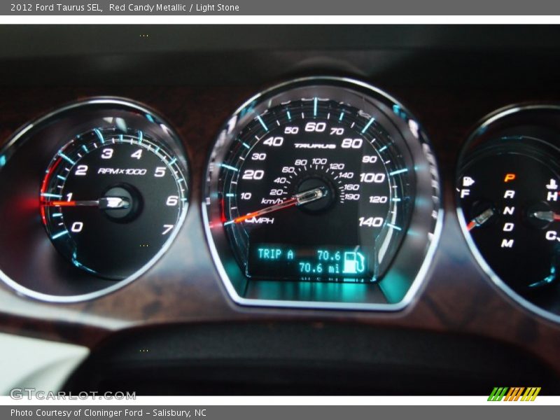 Red Candy Metallic / Light Stone 2012 Ford Taurus SEL