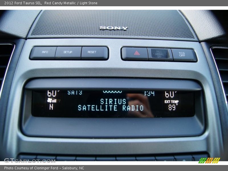Red Candy Metallic / Light Stone 2012 Ford Taurus SEL