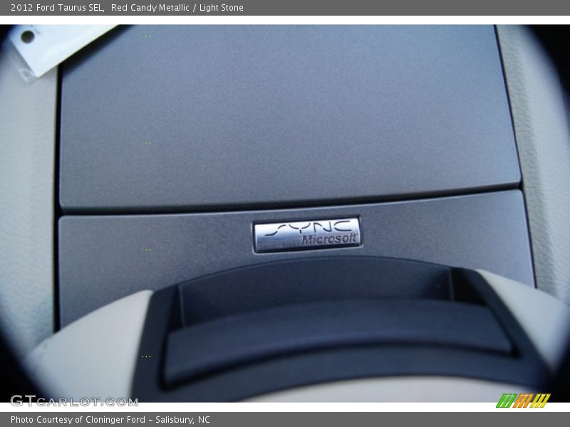 Red Candy Metallic / Light Stone 2012 Ford Taurus SEL