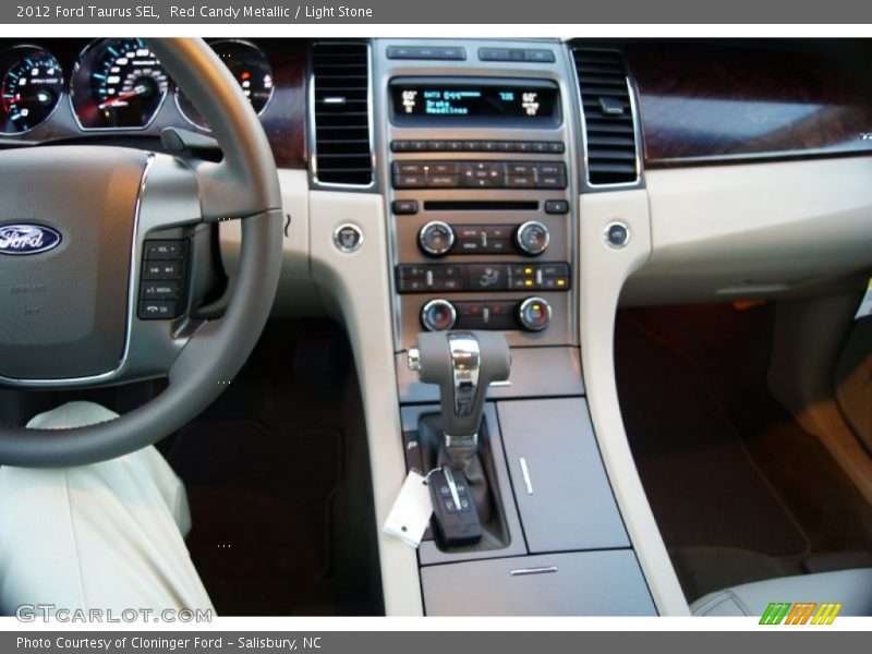 Red Candy Metallic / Light Stone 2012 Ford Taurus SEL