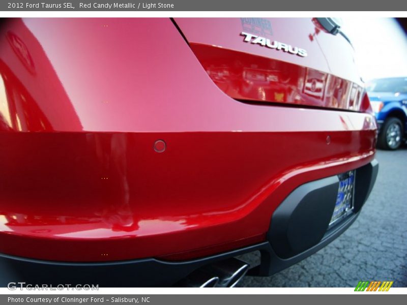 Red Candy Metallic / Light Stone 2012 Ford Taurus SEL