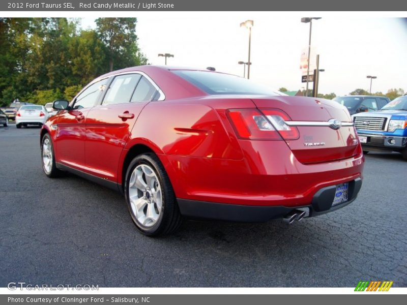 Red Candy Metallic / Light Stone 2012 Ford Taurus SEL