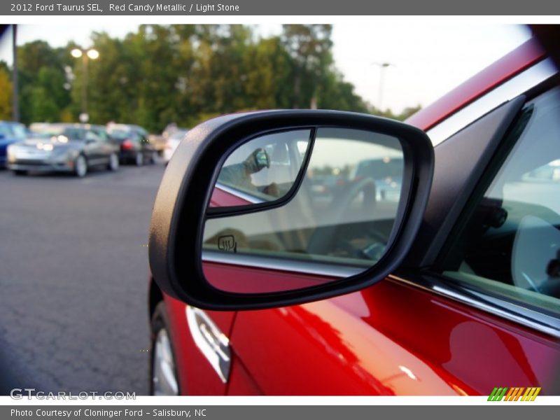 Red Candy Metallic / Light Stone 2012 Ford Taurus SEL