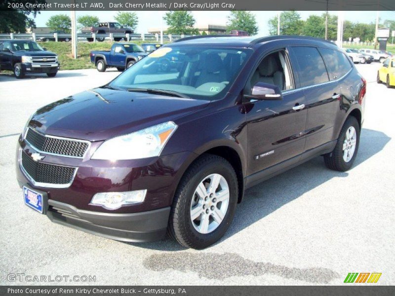 Dark Cherry Metallic / Dark Gray/Light Gray 2009 Chevrolet Traverse LT AWD