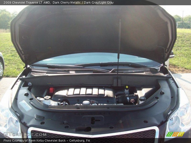 Dark Cherry Metallic / Dark Gray/Light Gray 2009 Chevrolet Traverse LT AWD