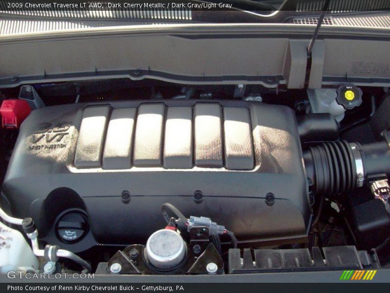 Dark Cherry Metallic / Dark Gray/Light Gray 2009 Chevrolet Traverse LT AWD