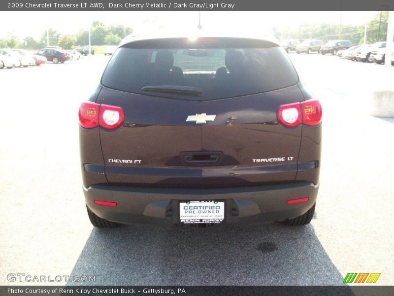 Dark Cherry Metallic / Dark Gray/Light Gray 2009 Chevrolet Traverse LT AWD