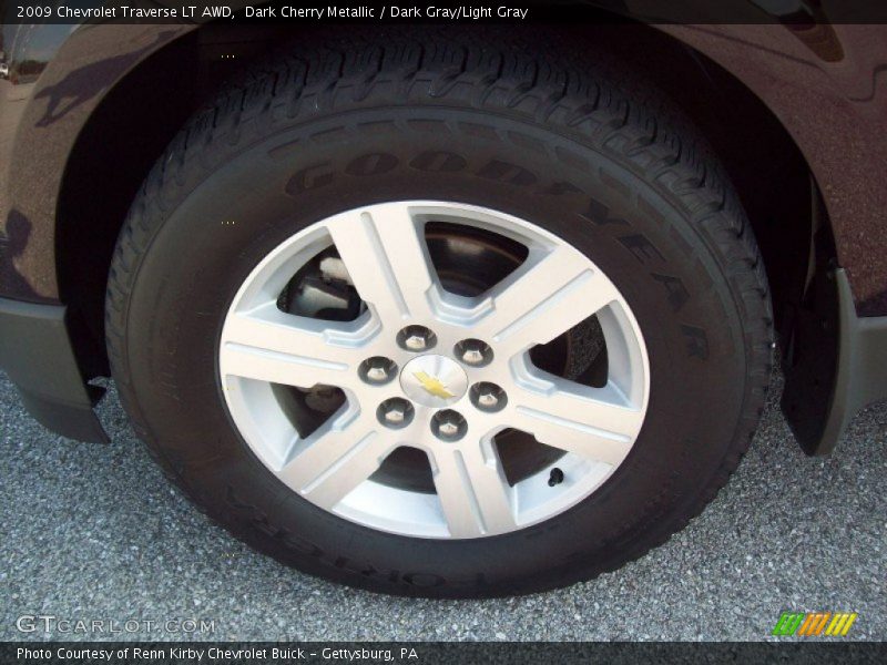 Dark Cherry Metallic / Dark Gray/Light Gray 2009 Chevrolet Traverse LT AWD