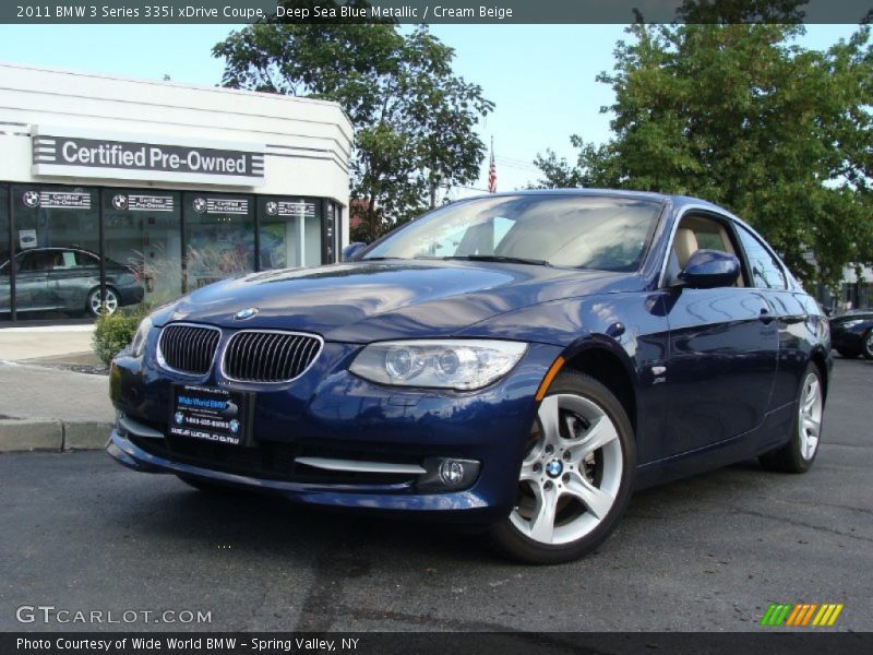 Deep Sea Blue Metallic / Cream Beige 2011 BMW 3 Series 335i xDrive Coupe