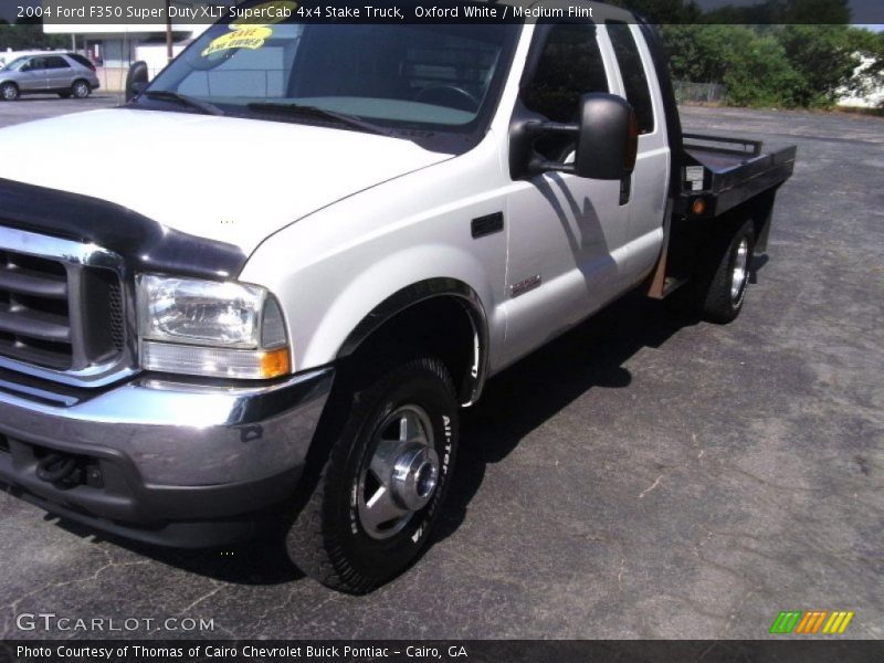 Oxford White / Medium Flint 2004 Ford F350 Super Duty XLT SuperCab 4x4 Stake Truck
