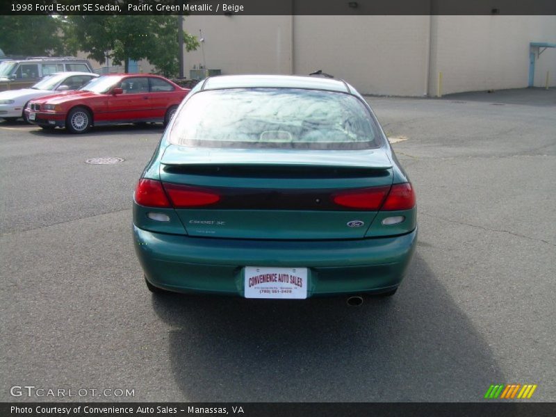 Pacific Green Metallic / Beige 1998 Ford Escort SE Sedan