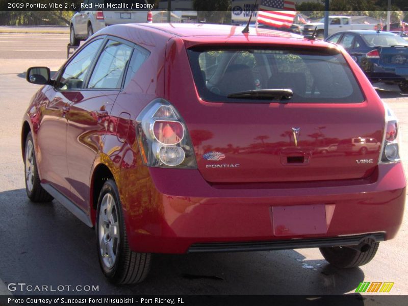 Red Hot Metallic / Ebony 2009 Pontiac Vibe 2.4