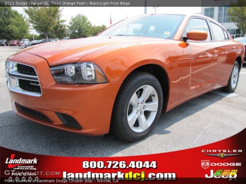 Toxic Orange Pearl / Black/Light Frost Beige 2011 Dodge Charger SE