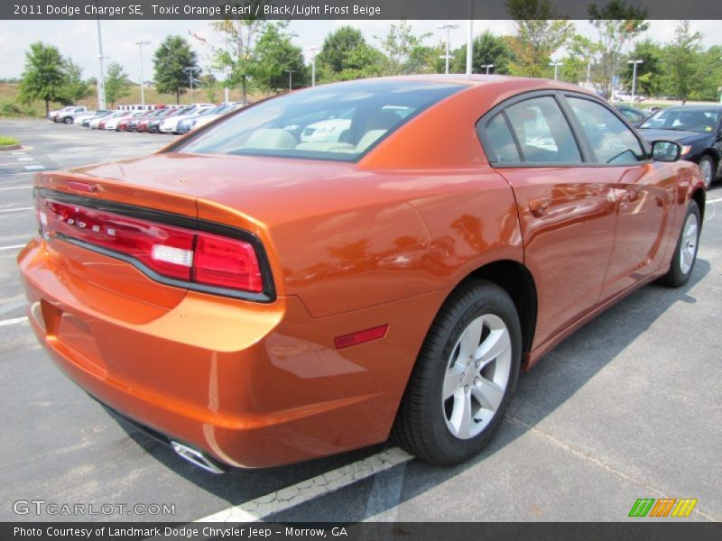 Toxic Orange Pearl / Black/Light Frost Beige 2011 Dodge Charger SE