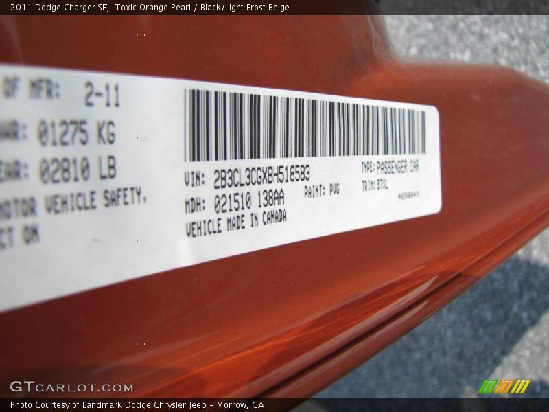 Toxic Orange Pearl / Black/Light Frost Beige 2011 Dodge Charger SE