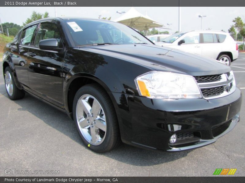 Front 3/4 View of 2011 Avenger Lux