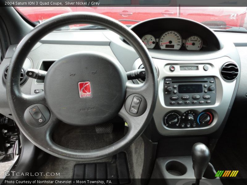 Dashboard of 2004 ION 3 Quad Coupe
