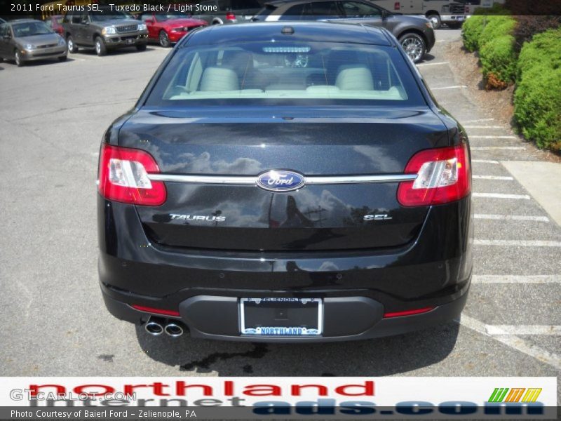 Tuxedo Black / Light Stone 2011 Ford Taurus SEL