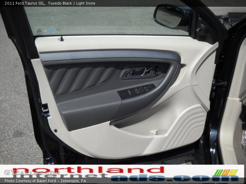 Tuxedo Black / Light Stone 2011 Ford Taurus SEL