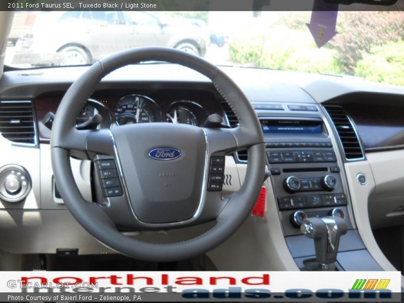 Tuxedo Black / Light Stone 2011 Ford Taurus SEL