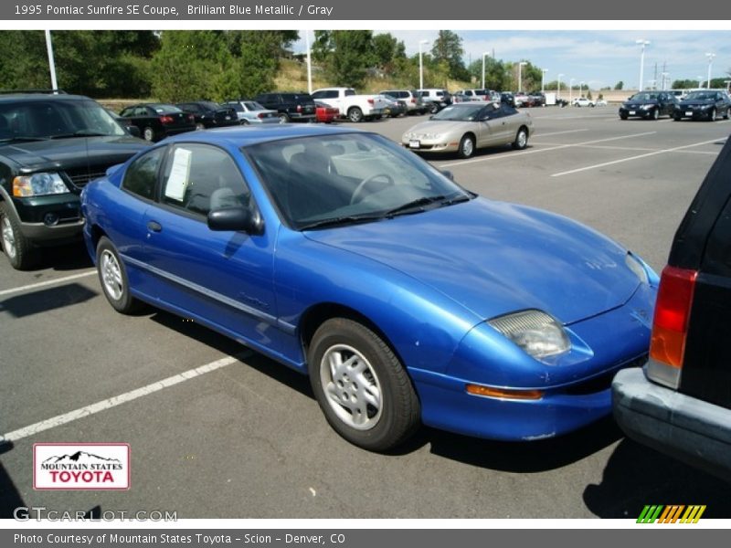 Brilliant Blue Metallic / Gray 1995 Pontiac Sunfire SE Coupe