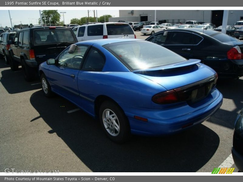Brilliant Blue Metallic / Gray 1995 Pontiac Sunfire SE Coupe