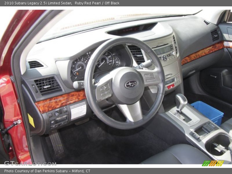 Ruby Red Pearl / Off Black 2010 Subaru Legacy 2.5i Limited Sedan