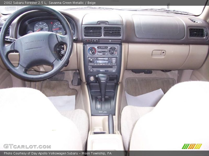 Savanna Green Metallic / Beige 2002 Subaru Forester 2.5 L