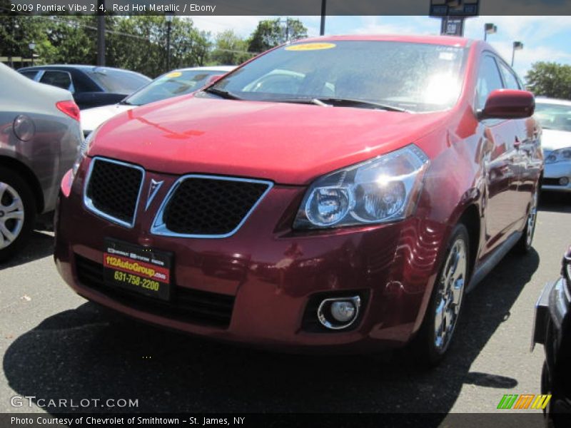 Red Hot Metallic / Ebony 2009 Pontiac Vibe 2.4