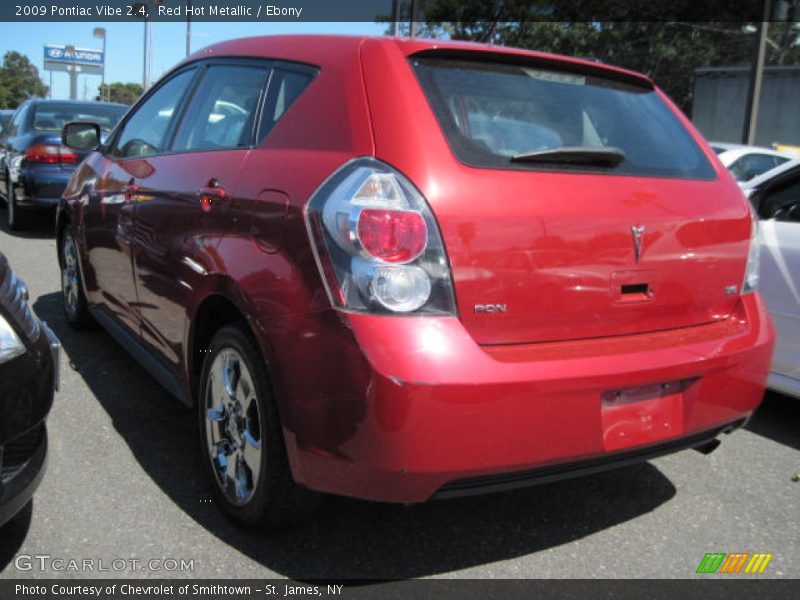 Red Hot Metallic / Ebony 2009 Pontiac Vibe 2.4