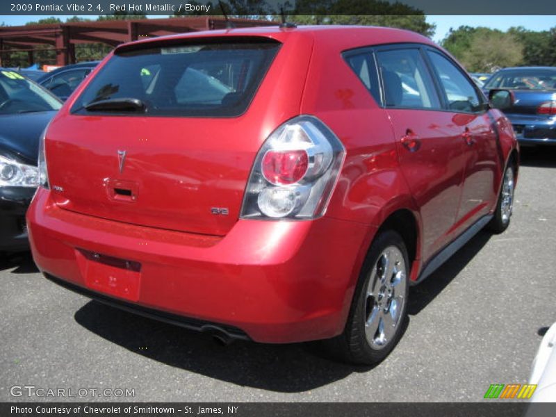 Red Hot Metallic / Ebony 2009 Pontiac Vibe 2.4