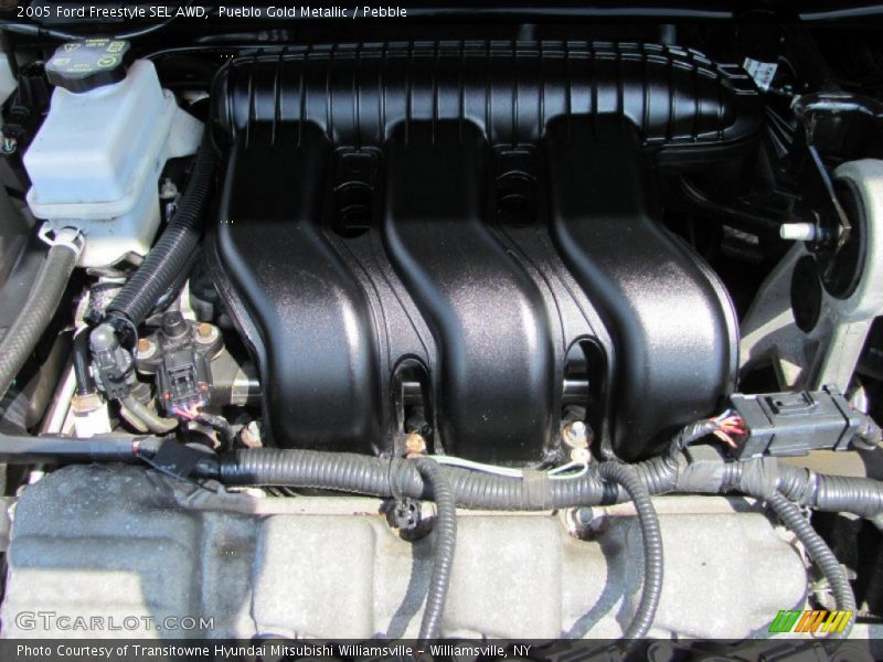 Pueblo Gold Metallic / Pebble 2005 Ford Freestyle SEL AWD