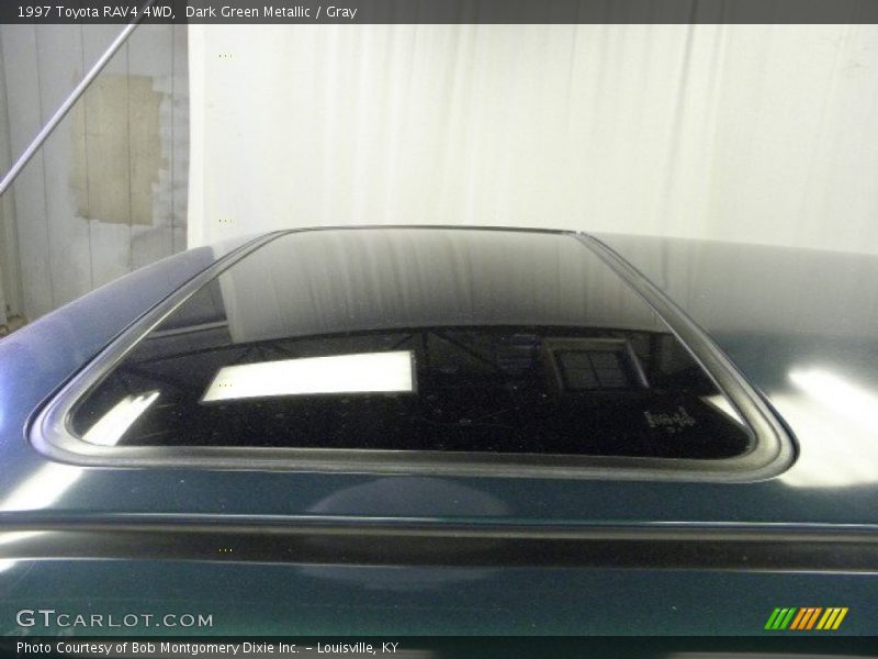 Dark Green Metallic / Gray 1997 Toyota RAV4 4WD