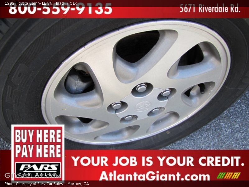 Black / Oak 1999 Toyota Camry LE V6