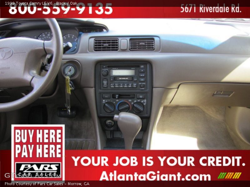 Black / Oak 1999 Toyota Camry LE V6
