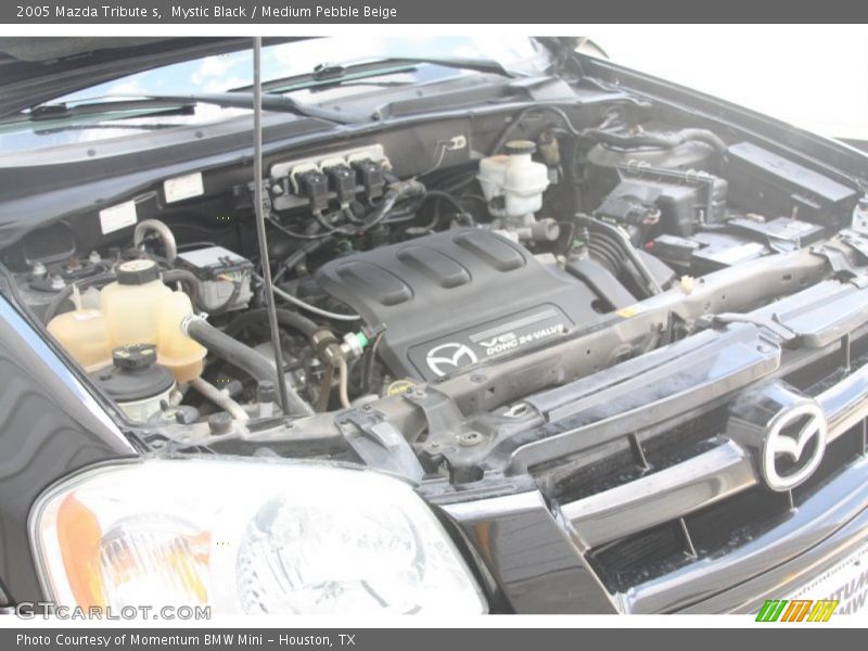 Mystic Black / Medium Pebble Beige 2005 Mazda Tribute s