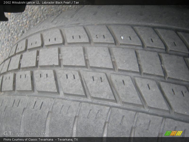 Labrador Black Pearl / Tan 2002 Mitsubishi Lancer LS