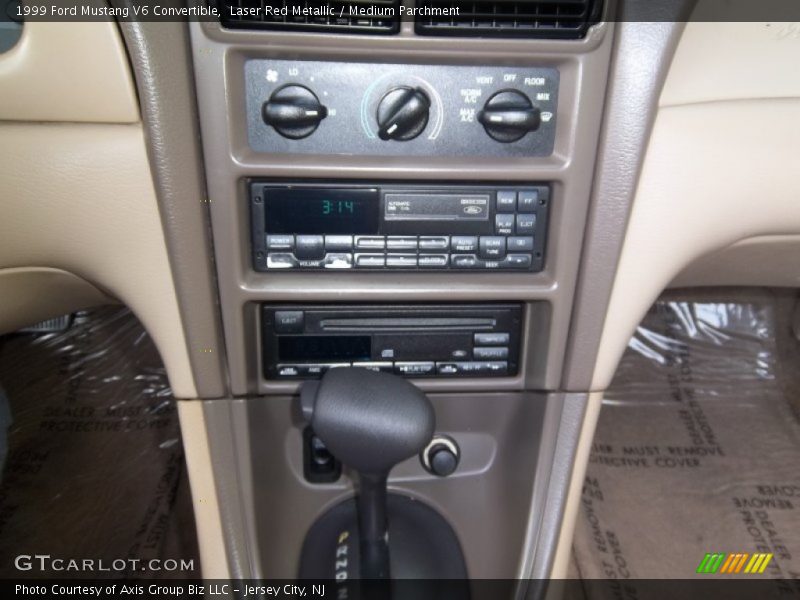 Laser Red Metallic / Medium Parchment 1999 Ford Mustang V6 Convertible