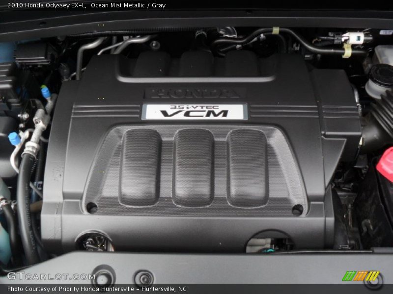 Ocean Mist Metallic / Gray 2010 Honda Odyssey EX-L