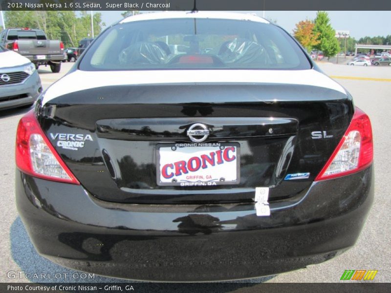 Super Black / Charcoal 2012 Nissan Versa 1.6 SL Sedan