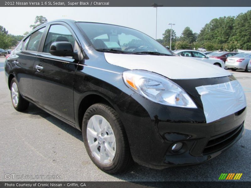 Super Black / Charcoal 2012 Nissan Versa 1.6 SL Sedan