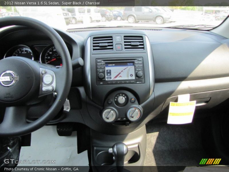 Super Black / Charcoal 2012 Nissan Versa 1.6 SL Sedan